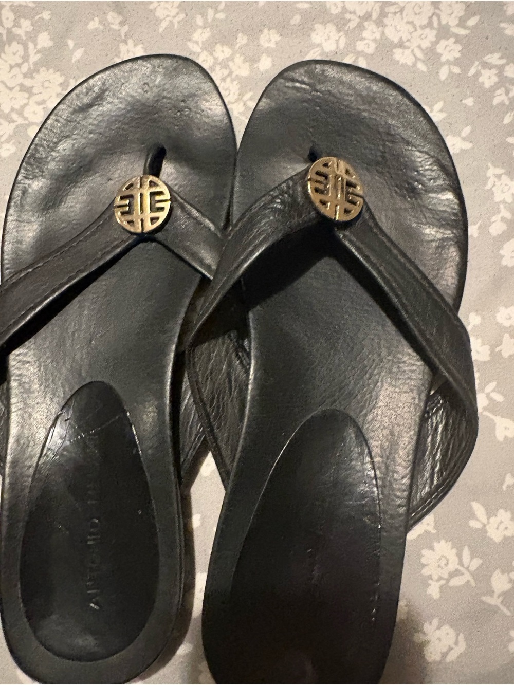 ANTONIO MELANI Black Leather Thong Sandals with Gold Emblem